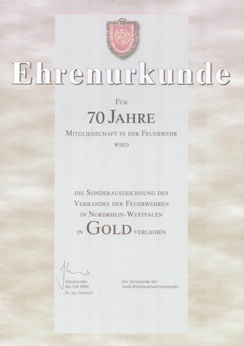 Ehrenurkunde / FÜR 50 JAHRE MITGLIEDSCHAFT IN DER FEUERWEHR WIRD xxxx DIE SONDERAUSZEICHNUNG DES VERBANDES DER FEUERWEHREN IN NORDRHEIN-WESTFALEN IN GOLD VERLIEHEN.